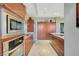 Sleek kitchen featuring stainless steel appliances and wood cabinetry at 4471 Dean Martin Dr # 3908, Las Vegas, NV 89103