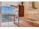 Gourmet kitchen with city views, stainless steel appliances, and granite counters at 4471 Dean Martin Dr # 3908, Las Vegas, NV 89103