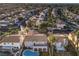 Aerial view of home with pool and community park nearby at 18 Tarryall Ter, Henderson, NV 89074