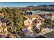 Two-story home with tile roof, two car garage, and mountain views at 18 Tarryall Ter, Henderson, NV 89074