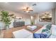 Living room with white sectional sofa and modern decor at 18 Tarryall Ter, Henderson, NV 89074