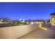 Private patio with scenic mountain views at night at 18 Tarryall Ter, Henderson, NV 89074