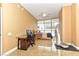 Bedroom setup with a large window, desk and massage table at 200 W Sahara Ave # 601, Las Vegas, NV 89102