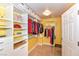 Custom walk-in closet with ample storage and clothing racks at 200 W Sahara Ave # 601, Las Vegas, NV 89102