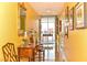 Hallway features a desk with lamps and a large mirror while leading to a brightly lit window at 200 W Sahara Ave # 601, Las Vegas, NV 89102