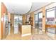 Bright kitchen boasting stainless steel appliances, a breakfast bar, and large windows for ample natural light at 200 W Sahara Ave # 601, Las Vegas, NV 89102