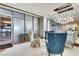 Lobby area featuring comfortable seating, contemporary chandelier, and sophisticated decor at 200 W Sahara Ave # 601, Las Vegas, NV 89102