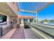 This outdoor kitchen features stainless steel appliances, granite countertops, and a built-in grill for convenient outdoor entertaining at 200 W Sahara Ave # 601, Las Vegas, NV 89102