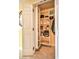 Open pantry showcases shelving holding various food items and appliances, adding convenience at 200 W Sahara Ave # 601, Las Vegas, NV 89102