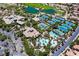 Aerial view of community amenities including pools, tennis courts, and golf course at 2080 Orchard Mist St, Las Vegas, NV 89135