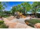 Community playground with modern playset and shaded area at 2080 Orchard Mist St, Las Vegas, NV 89135