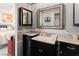 Cozy bathroom featuring modern vanity with a framed mirror and a glimpse into the Primary bedroom at 3843 Desert Marina Dr # 232, Laughlin, NV 89029