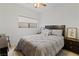 Cozy bedroom with plush bedding, wood floors, and dark wood furniture at 3875 Desert Marina Dr # 236, Laughlin, NV 89029