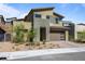 Modern two-story house with attached garage and landscaped front yard at 437 Cascade Heights Ave, Las Vegas, NV 89138