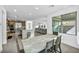 Open concept kitchen and dining area with modern design at 437 Cascade Heights Ave, Las Vegas, NV 89138