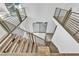 Modern wood and metal staircase viewed from above at 437 Cascade Heights Ave, Las Vegas, NV 89138