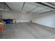 This spacious garage is clean and has epoxy flooring, offering ample space for vehicles and storage at 4920 Blue Rose St, North Las Vegas, NV 89081