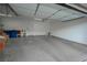 Attached garage with epoxy flooring and ample storage at 4920 Blue Rose St, North Las Vegas, NV 89081