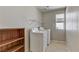 Laundry room with shelving, washer, and dryer at 4977 Crimson Mare Rd, Las Vegas, NV 89139