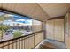 Private balcony with a view of the parking lot and surrounding buildings at 5116 River Glen Dr # 224, Las Vegas, NV 89103