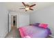 Cozy bedroom with carpet, closet, ceiling fan and doorway to other rooms at 5944 Vizzi Ct, Las Vegas, NV 89131