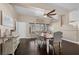 Dining room with wood floors, stylish table set, and natural light at 5944 Vizzi Ct, Las Vegas, NV 89131