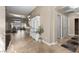 Inviting entryway with bench seating and views to the dining area at 5944 Vizzi Ct, Las Vegas, NV 89131