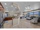 Spacious kitchen open to living area, features granite counters and stainless steel appliances at 5944 Vizzi Ct, Las Vegas, NV 89131