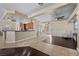 Open living space showcasing tile flooring, modern decor, and functional entryway storage at 5944 Vizzi Ct, Las Vegas, NV 89131