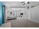 Bright and spacious main bedroom featuring vaulted ceilings, plush carpeting, and a charming fireplace at 5944 Vizzi Ct, Las Vegas, NV 89131