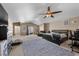 Spacious main bedroom with sitting area and access to balcony at 5944 Vizzi Ct, Las Vegas, NV 89131