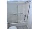 Bathroom with a shower-tub combination enclosed with a sliding glass door at 1381 E University Ave # 102, Las Vegas, NV 89119