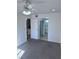 A well-lit bedroom with a ceiling fan offers a comfortable living space at 1381 E University Ave # 102, Las Vegas, NV 89119