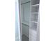 Spacious walk-in closet with built-in shelves and drawers, ideal for organization at 1381 E University Ave # 102, Las Vegas, NV 89119