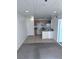 Charming kitchen with tiled floors, modern appliances, and plenty of storage space at 1381 E University Ave # 102, Las Vegas, NV 89119