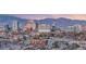 Stunning aerial view of the city skyline with mountain backdrop at 222 Karen Ave # 1702, Las Vegas, NV 89109