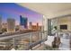Spacious balcony with city views and seating area at 222 Karen Ave # 1702, Las Vegas, NV 89109
