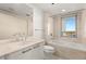 Modern bathroom with bathtub, toilet and city views at 222 Karen Ave # 1702, Las Vegas, NV 89109