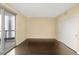 Bedroom with hardwood floors and access to a balcony at 222 Karen Ave # 1702, Las Vegas, NV 89109