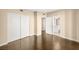 Bright bedroom with hardwood floors and access to a bathroom at 222 Karen Ave # 1702, Las Vegas, NV 89109