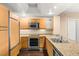 Modern kitchen with granite countertops and stainless steel appliances at 222 Karen Ave # 1702, Las Vegas, NV 89109