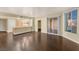 Living room with hardwood floors and access to balcony at 222 Karen Ave # 1702, Las Vegas, NV 89109