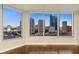 Living room with hardwood floors and stunning city views at 222 Karen Ave # 1702, Las Vegas, NV 89109