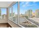 Living room with floor-to-ceiling windows and city views at 222 Karen Ave # 1702, Las Vegas, NV 89109