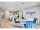 Open kitchen and dining area with a view of the stainless steel appliances at 2391 Dalewood Ave, North Las Vegas, NV 89086