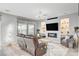 Bright and airy living room with a fireplace, recessed lighting, and backyard views at 2391 Dalewood Ave, North Las Vegas, NV 89086