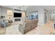 Modern living room with recessed lighting, a fireplace, and neutral decor at 2391 Dalewood Ave, North Las Vegas, NV 89086