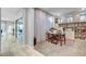 Bright home office with built-in shelves and cabinets, offering ample storage and organization at 2391 Dalewood Ave, North Las Vegas, NV 89086