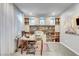 This neutral office includes a built-in bookcase with shelving and cabinets above at 2391 Dalewood Ave, North Las Vegas, NV 89086