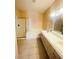 Bathroom features a double vanity, bathtub and shower with tile flooring at 5048 Orchid Springs St, Las Vegas, NV 89148